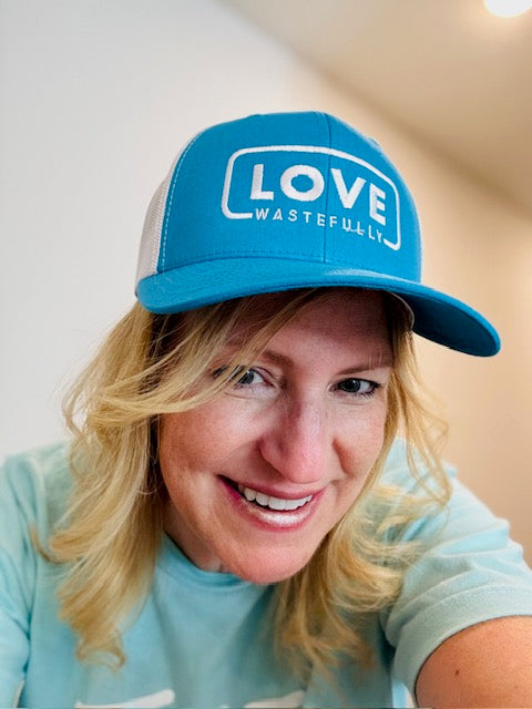 LOVE WASTEFULLY TRUCKER hat