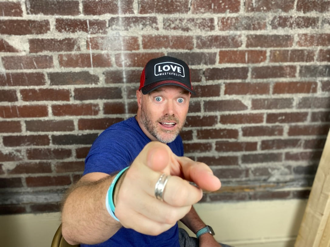 LOVE WASTEFULLY TRUCKER hat